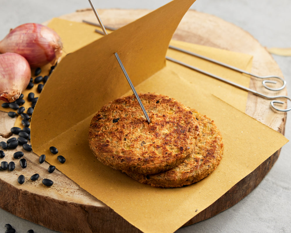 Burger ortolano fave, fagioli neri e broccoli