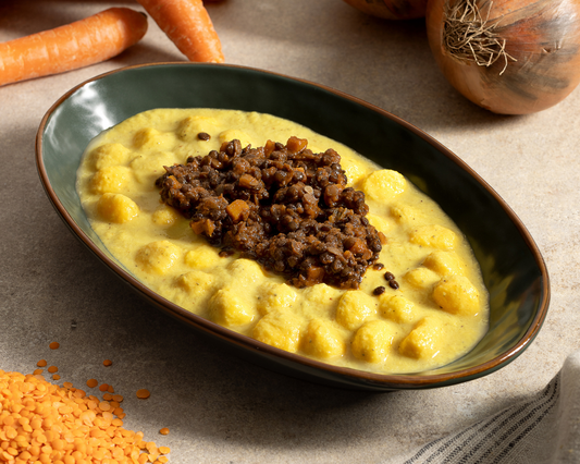 Chicche di mais al ragù cremoso di lenticchie