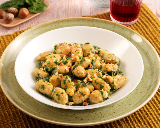 Gnocchi di patate dolci con spinaci saltati e curcuma