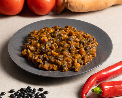 Stufato speziato di fagioli neri e batata rossa